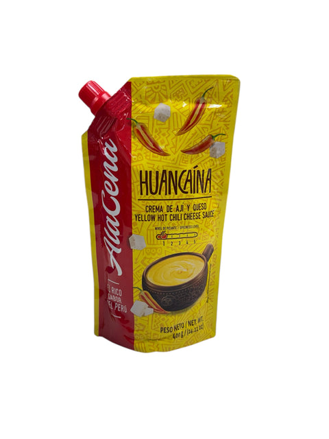 Pouch of AlaCena Huancaina yellow hot chili cheese sauce with red and yellow packaging - front of pouch